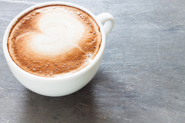 Coffee cup on grey background