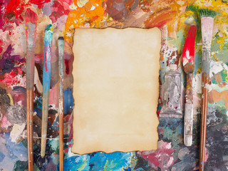  Brush and paper on oil-paint palette for background