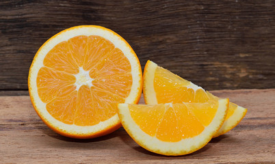 orange fruit on wooden table