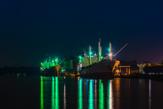 General cargo ship at night