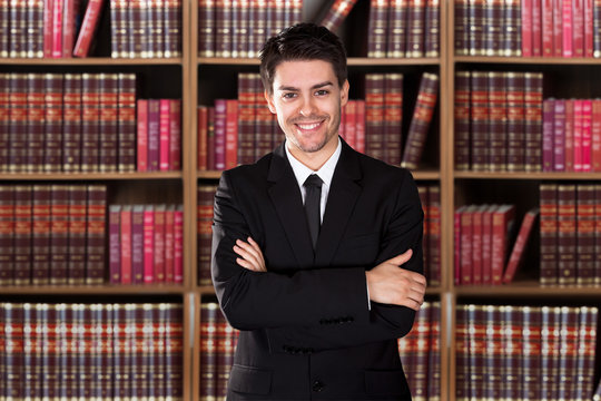Confident Lawyer Standing Arms Crossed