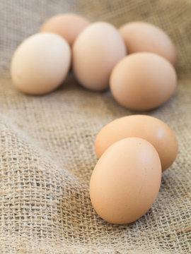 Fresh farm eggs on sackcloth
