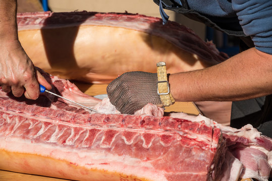 Butcher Hands On Fresh Pork