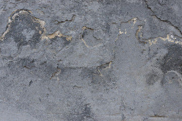 Wall fragment with attritions and cracks