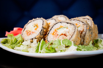 Set of rolls on a wooden dark table.
