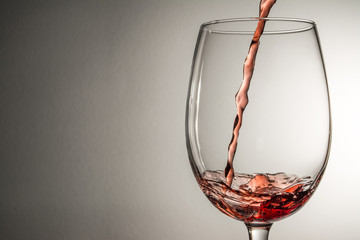 Naklejka na ściany i meble wine, splashing, splash, stream of wine being poured into a glass isolated