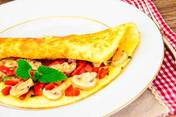 Healthy and Diet Food: Scrambled Eggs with Mushrooms and Vegetab