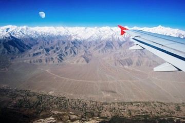 airplane fly on Himalaya mountains. Ladakh, India