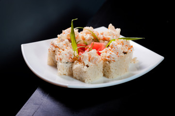 Set of rolls on a wooden dark table.