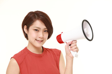 young Japanese woman with megaphone