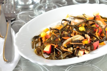 seaweed salad with carrot, corn , crab sticks, squid © tktyfy