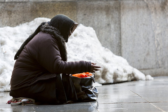 Anonymous female beggar
