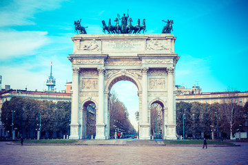 Fototapeta na wymiar Milan city monuments and places Arch of Peace park - vintage style photo 