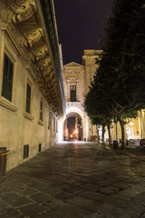Fototapeta na wymiar Arch on Old Theatre Street, Palace of the Grand Master Valletta