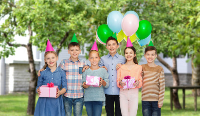 happy children with gifts on birthday party