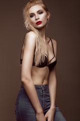 Fototapeta premium sexy fashion model with long hair, young European attractive, beautiful eyes, red lips, perfect skin is posing in studio for glamour vogue test photo shoot showing different poses