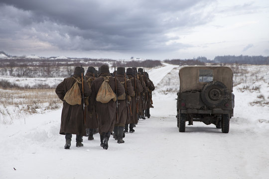 Soviet soldiers in a winter field
