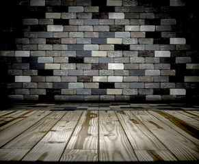 Wood table and brick wall in background