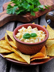Dip cheese with egg and tortilla chips