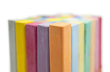 stack of variety colors of chalk pastel, close up