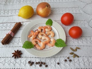 Сooking healthy food with shrimps and tomato