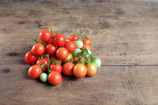 fresh tomato on wooden