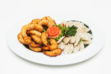 Thai steamed rice-skin dumplings with fried shrimp.