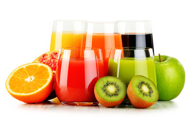 Glasses of assorted fruit juices isolated on white. Detox diet