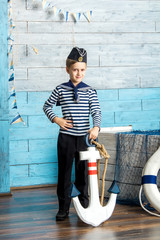 boy holding anchor