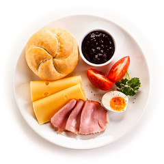 Breakfast - boiled egg, bacon, cheese and vegetables