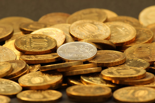 
Golden coins. Pile of gold coin. Financial, business concept. Heap of metallic golden roubles. Ruble.