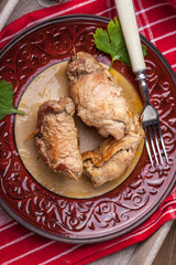 Rolls pork on the plate.