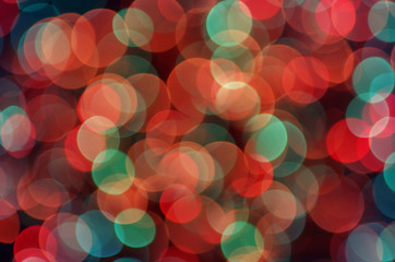 Defocused abstract multicolored bokeh lights background. Colourful festive multi colored circles.