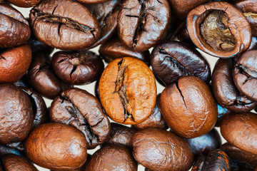 Heap of coffee beans on the table