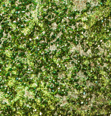 Fototapeta na wymiar Uvarovite (green garnet), crystallization on rock