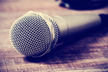 microphone on a wooden surface, filtered