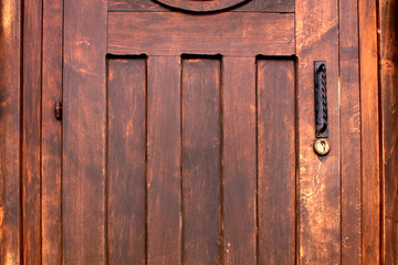 door of dark wood planks