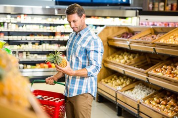 Young man doing shopping 