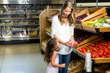 Mother and daughter doing shopping  