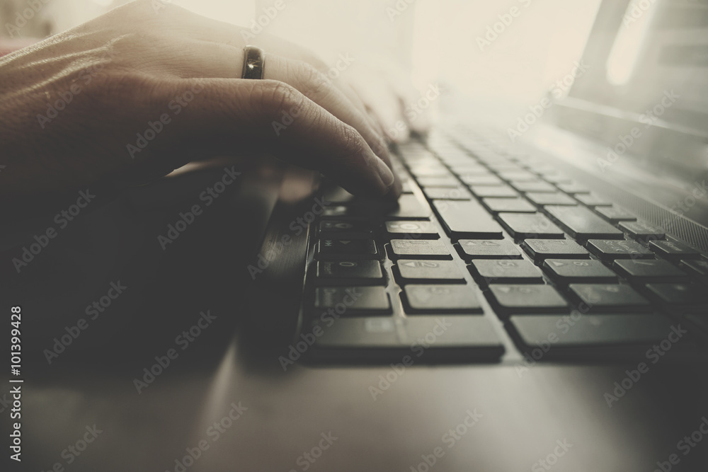 Poster man hand on computer