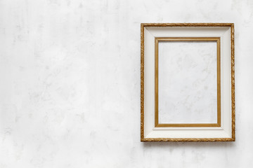 old frame on a white wall.