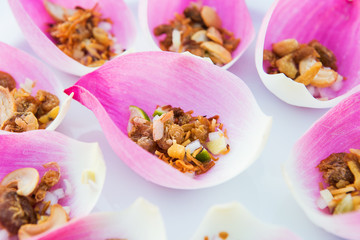 Mix fried rice contained in lotus flower leaf