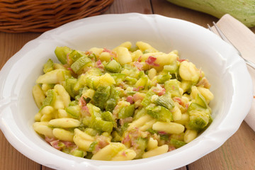 Cavatelli pasta with bacon and courgettes