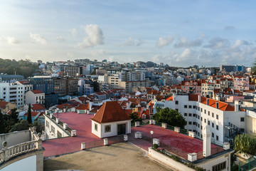 Panorama of old traditional city of Lisbon with red roofs. Portugal.