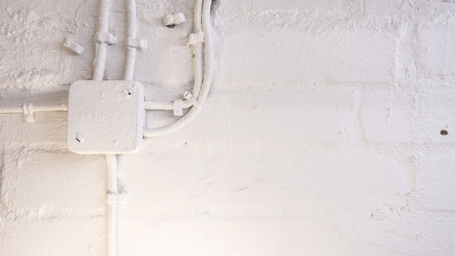 Electrical Box And Cables On Wall, Painted White