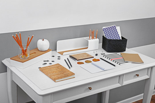 Office and school set with stationery and notebooks on a table