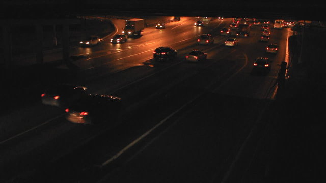 Cars Moving on Night Higway at Rush Hour