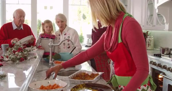 Family With Grandparents Prepare Christmas Meal Shot On R3D