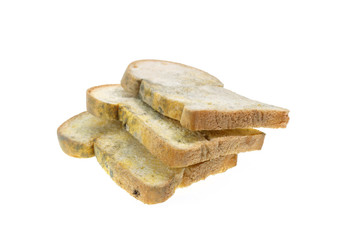 Stack of moldy bread isolated on white background