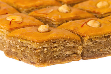 Baklava on white background. Selective focus.